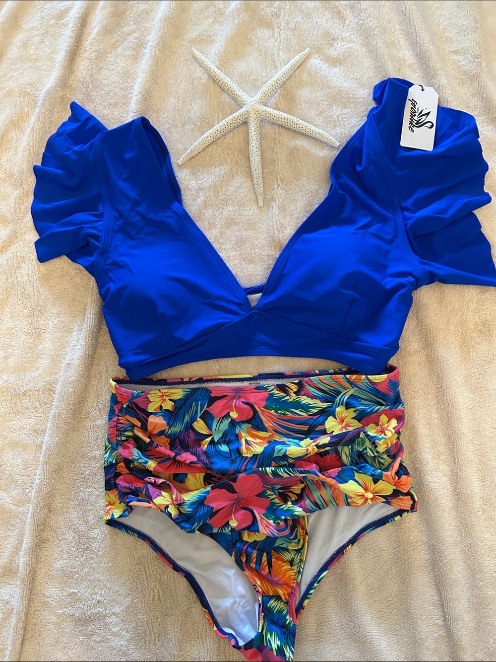 NWT blue/ flowered swimsuit